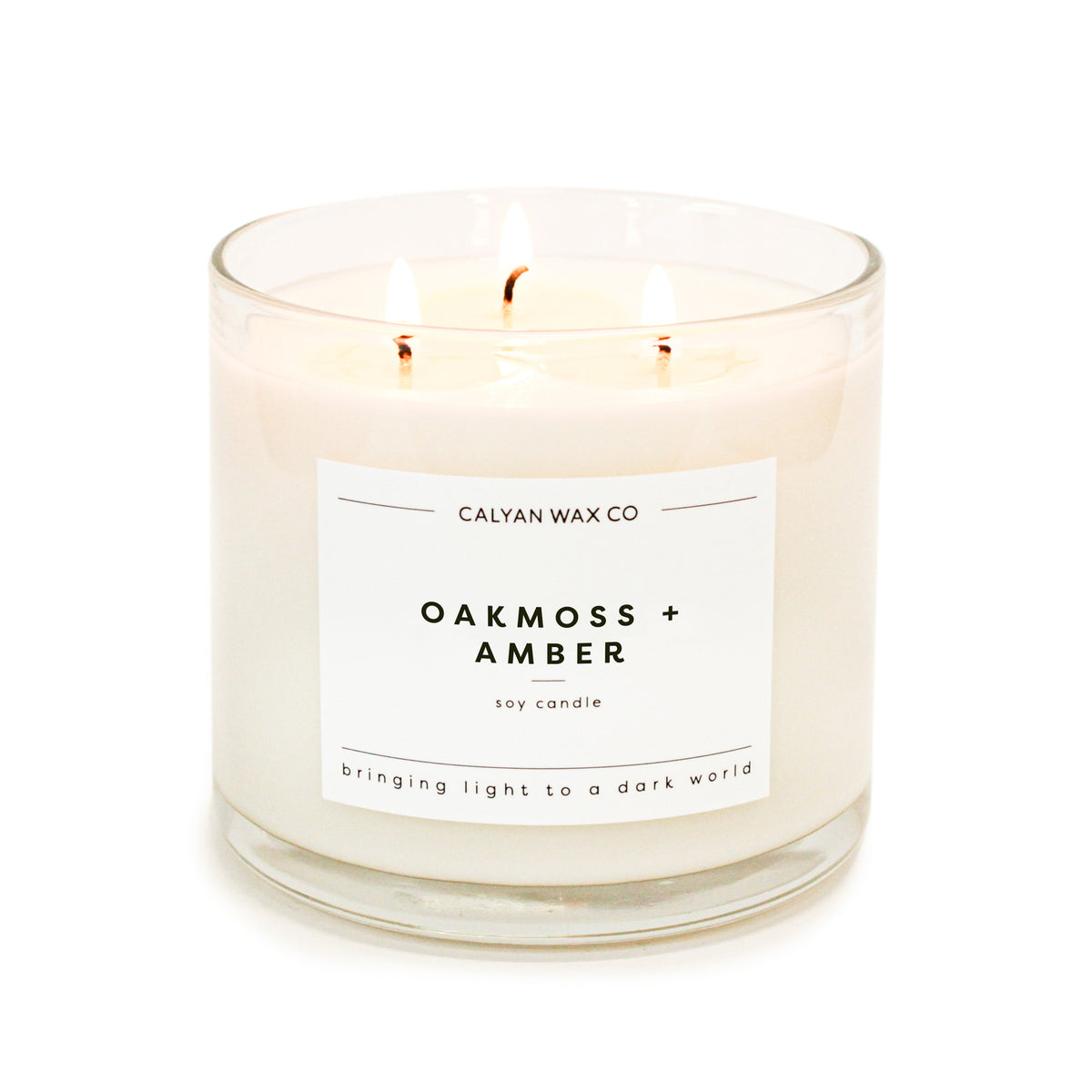 Oakmoss + Amber 15 oz. 3-Wick Clear Glass Soy Candle - Calyan Wax Co.